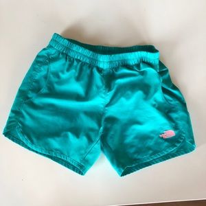The North Face teal swim shorts, small